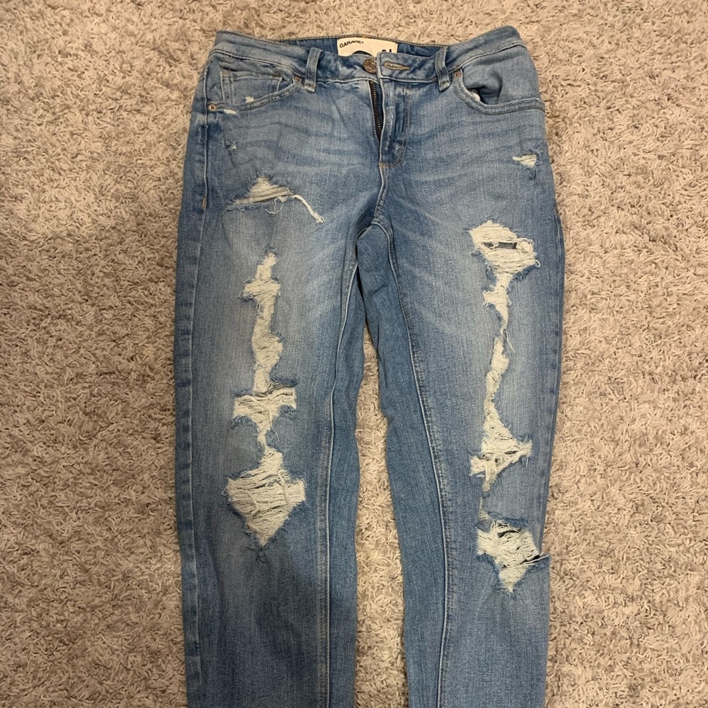 Girlfriend size 1 garage jeans with rips